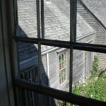 geraniums from window. Photo © C. Ashley Spencer