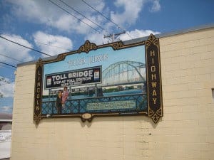 Fulton historic mural depicting the Lincoln Hwy via Quad City TImes on Art is Everywhere