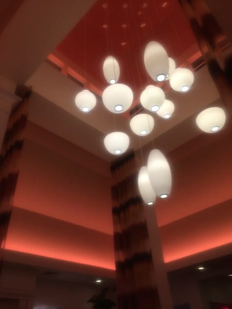 Hilton Vestibule Lights surrounded by ever changing florescent lighting on Art Is Everywhere